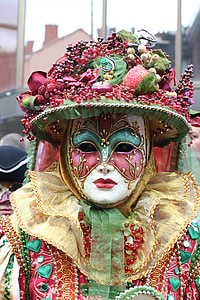 multicolored mask costume with fruit headdress