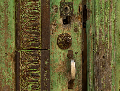 closeup photo of green wooden door