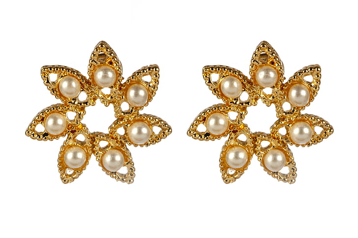 pair of gold-colored earrings with white pearls