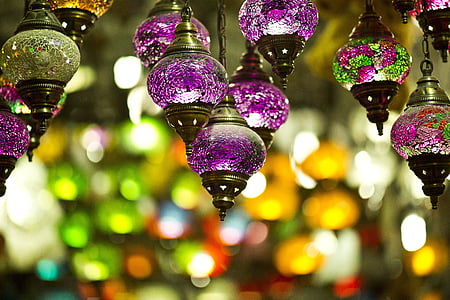 purple pendant lights in selective-focus photography