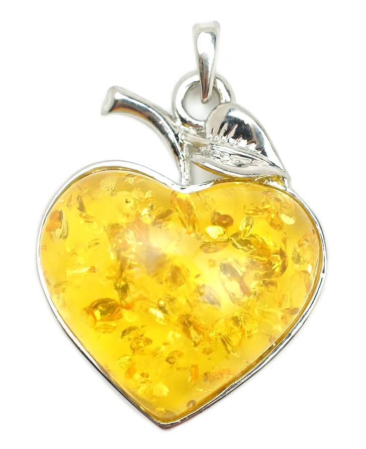 apple-shaped silver-colored pendant