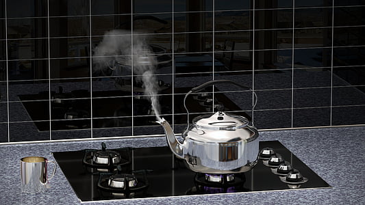 silver kettle on gas range