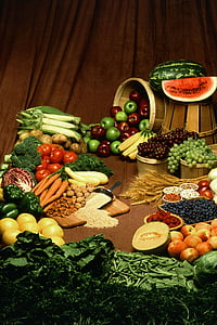 variety of fruits and vegetables on top of wooden table
