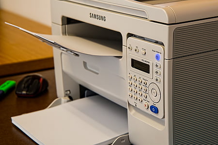 photo of white Samsung multi-function printer