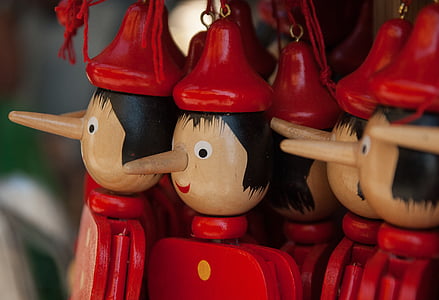 selective focus photography of Pinocchio puppets