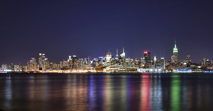 panoramic photography of skyline cityscape at nightime