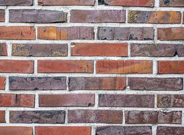 close-up photography of brown brick surface