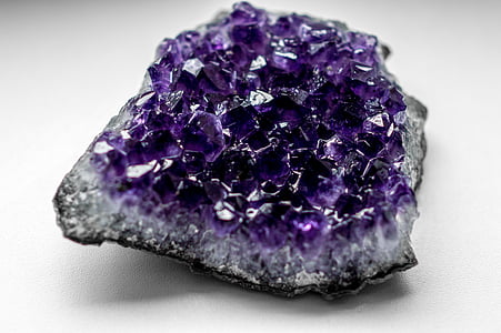 purple geode on white table top