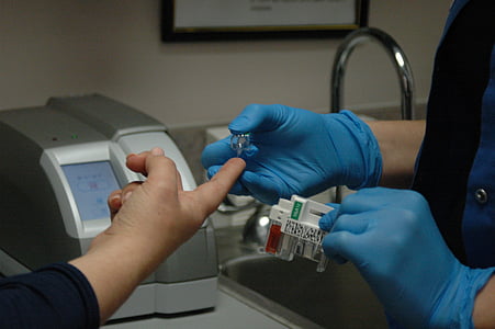 person getting blood sample