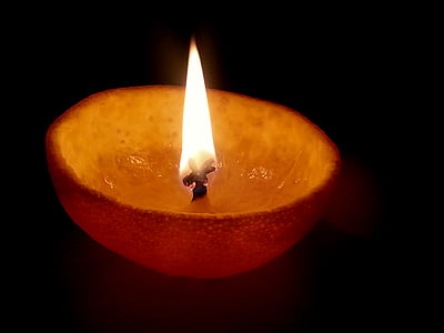 shallow focus photography of oil candle