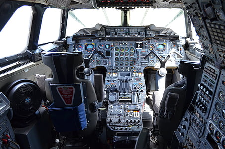 photo of black and gray plane cockpit interior