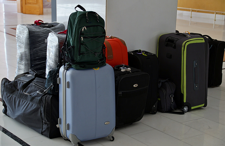 assorted-color travel luggage