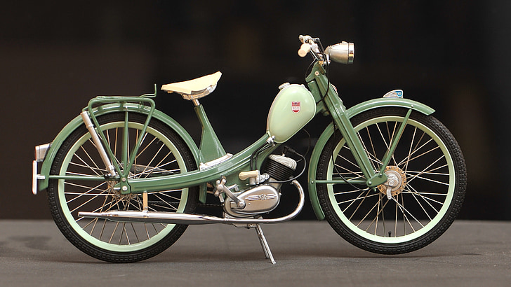 teal and green pedal moped bike