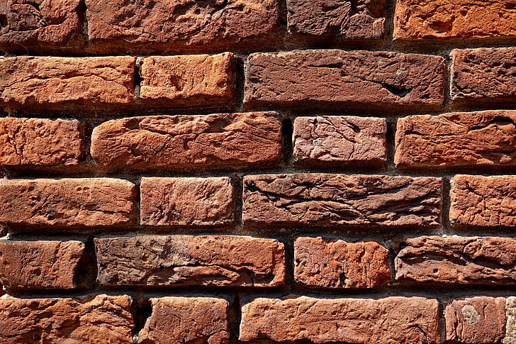 photo of brown brick wall