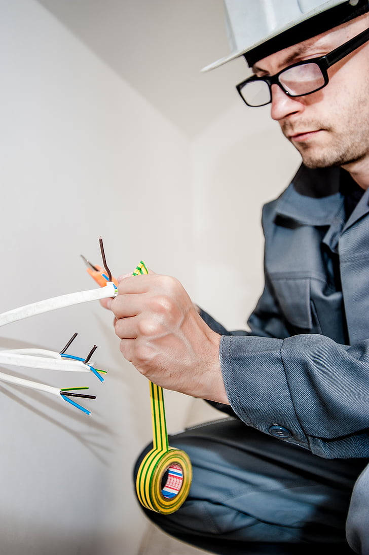 man working on electric wire