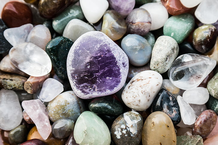white, black, and purple stones