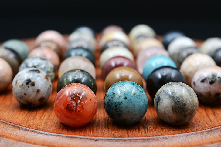 assorted-color marble balls inline
