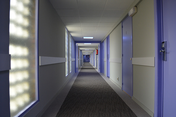 photography of white hallway