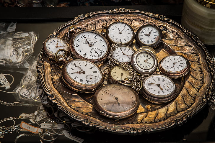 photo of round gold-colored pocketwatch lot