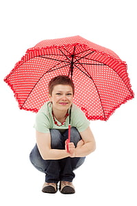 woman sitting holding umbrella