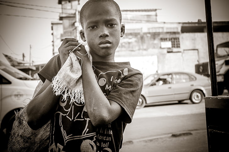 boy carrying sack photography