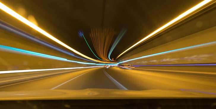 panning photo of tunnel roadway