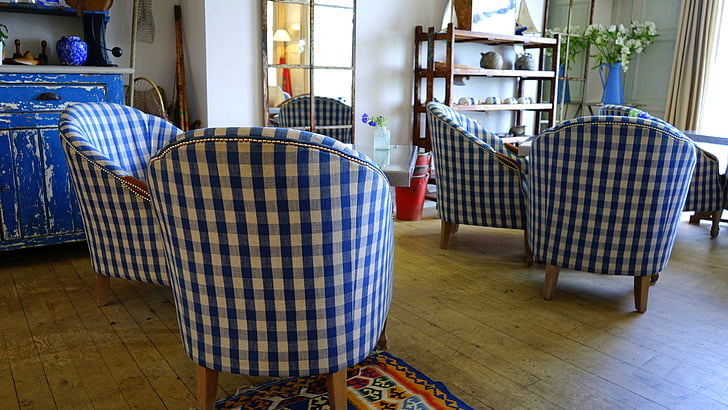 blue and white checked chairs in room