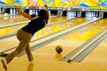 woman playing bowling