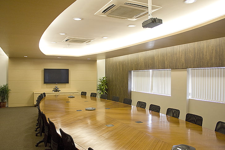 brown and gray painted conference room taken