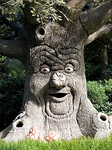 brown tree with face artwork