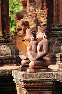 brown monkey statues