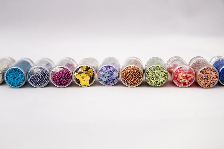 assorted-color bead containers