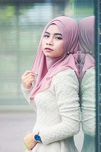 woman wearing pink hijab