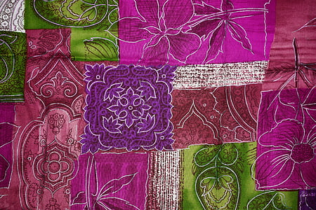 closeup photo of purple, brown, and green floral cloth