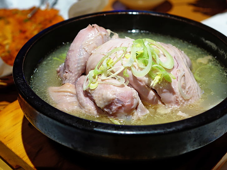 chicken soup on black pot