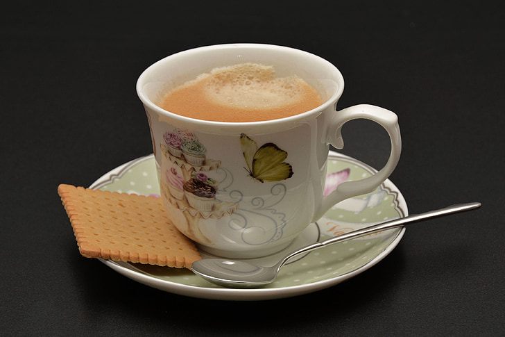 mug of coffee on saucer
