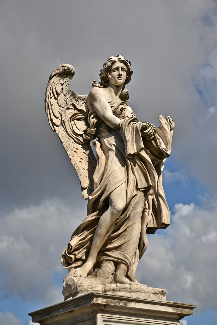 photo of man with wings statue