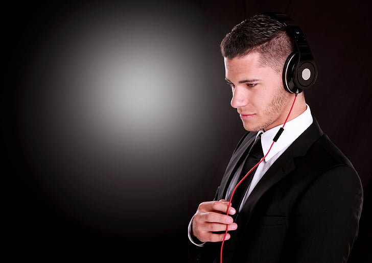 man wearing black headphones
