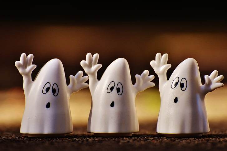 three white ghost plastic figures