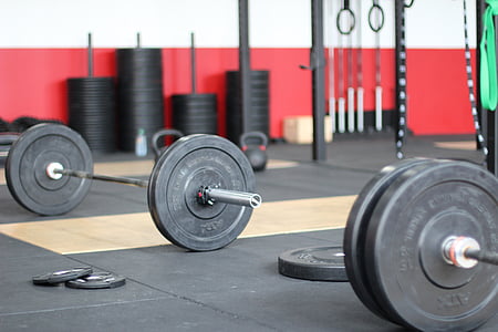 black barbells and plates
