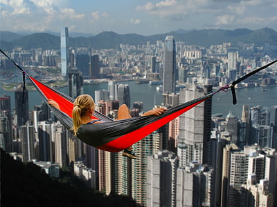 woman in red and black hammock