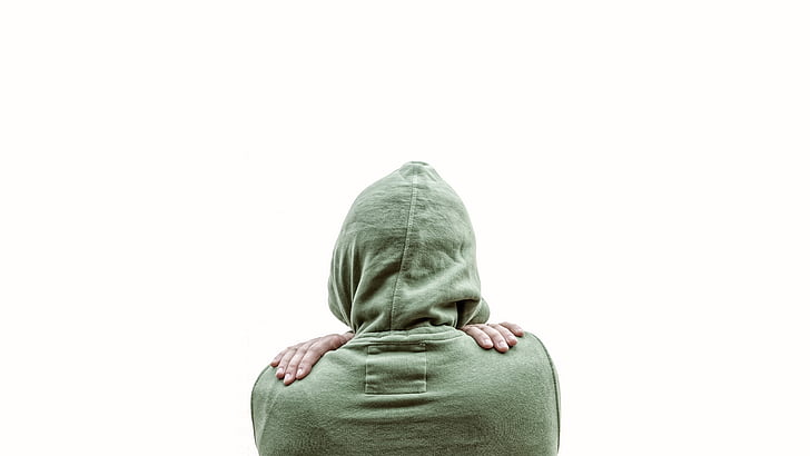 person wearing green hoodie