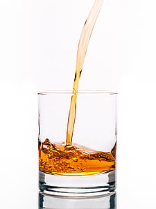 clear shot glass with liquid