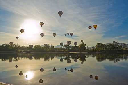 hot air balloon event during day time