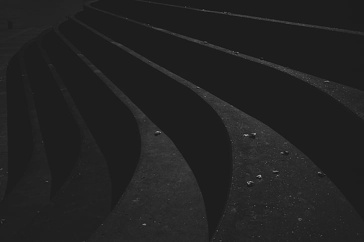 grayscale photography of black concrete stairs