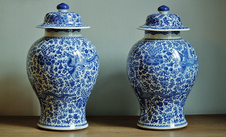 two white-and-blue floral ceramic vases