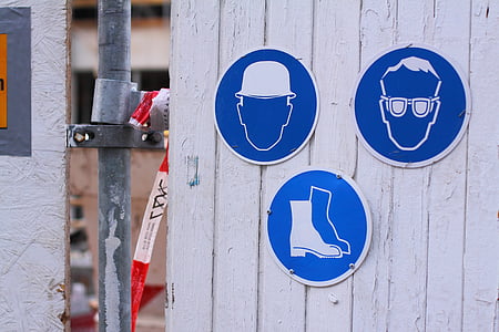 three blue and white signages