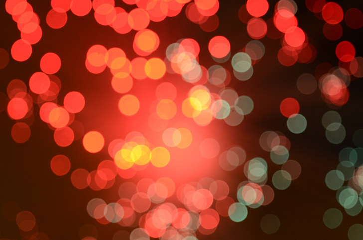 bokeh photography of red and green lights