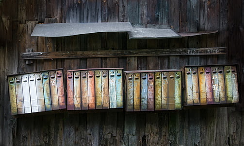four multicolored steel racks