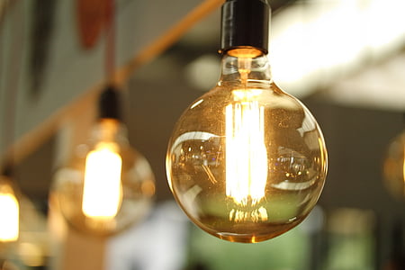 selective focus photography of turned on Edison bulb